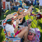 Crowd of festivalgoers seated on the lawn enjoying Soul Springs Festival
