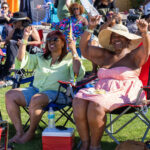 Attendees cheering from lawn chairs at Soul Springs Festival