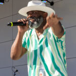 Male singer performing on stage at Soul Springs Festival