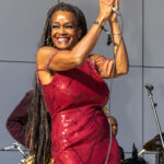 Female vocalist performing on stage at Soul Springs Festival