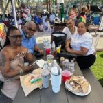 Friends enjoying a picnic table at Soul Springs Festival