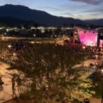 Aerial view of the Soul Springs Festival stage and crowd at dusk in Palm Springs